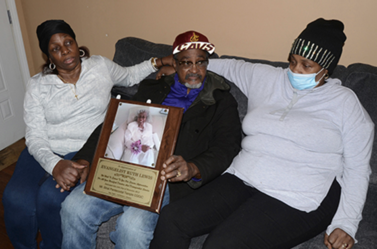 Lewis funeral wheelchair family shots matriarch Ohio bullet