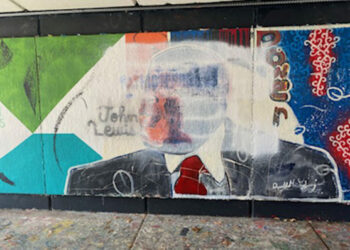 Mural, Black figures, Defaced, Vandalized, Washington University, St.Louis, Missouri, Racist, Symbols.