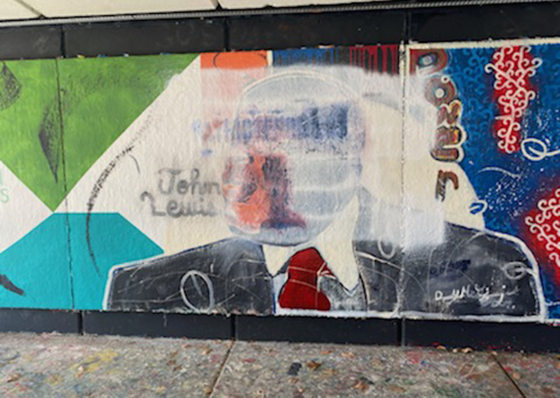 Mural, Black figures, Defaced, Vandalized, Washington University, St.Louis, Missouri, Racist, Symbols.
