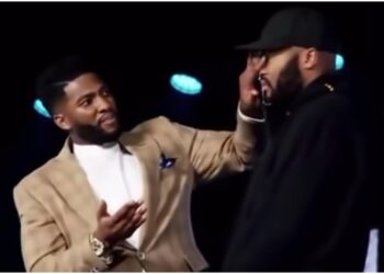 Pastor Mike Todd spit