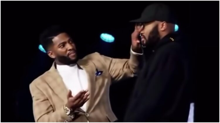 Pastor Mike Todd spit