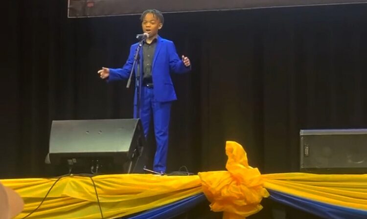 Jordan Hollins fifth-grader Sam Cooke 'A Change Is Gonna Come' song Louisiana audience