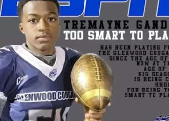 youth league football team Glenwood Cougars suspended playoffs talented 13-year-old player Tremayne Gandy Jr. promoted high school